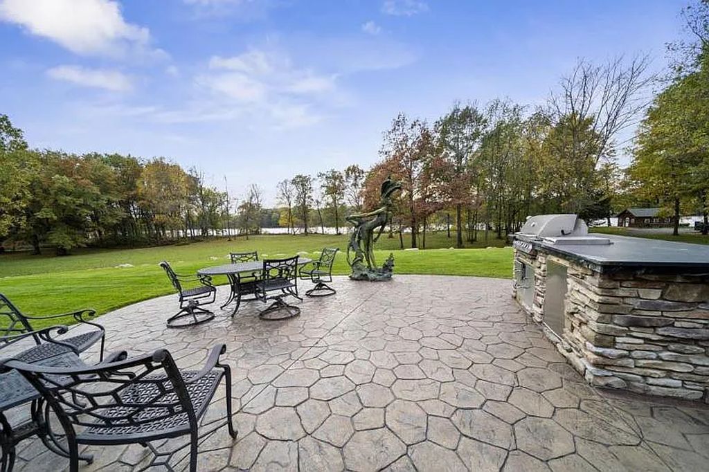 The Estate in Stevens Point is a luxurious home with a gated entrance, a lighted driveway to open up a paradise of entertainment for you now available for sale. This home located at 2688 Scenic Drive, Stevens Point, Wisconsin; offering 03 bedrooms and 05 bathrooms with 7,095 square feet of living spaces.