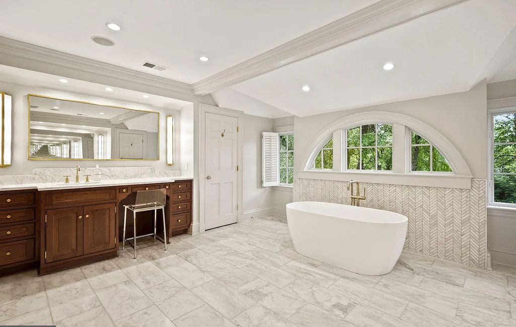 The Estate in Potomac is a luxurious home set on private lot with mature trees and professionally designed landscaping now available for sale. This home located at 9000 Congressional Pkwy, Potomac, Maryland; offering 06 bedrooms and 10 bathrooms with 14,745 square feet of living spaces.