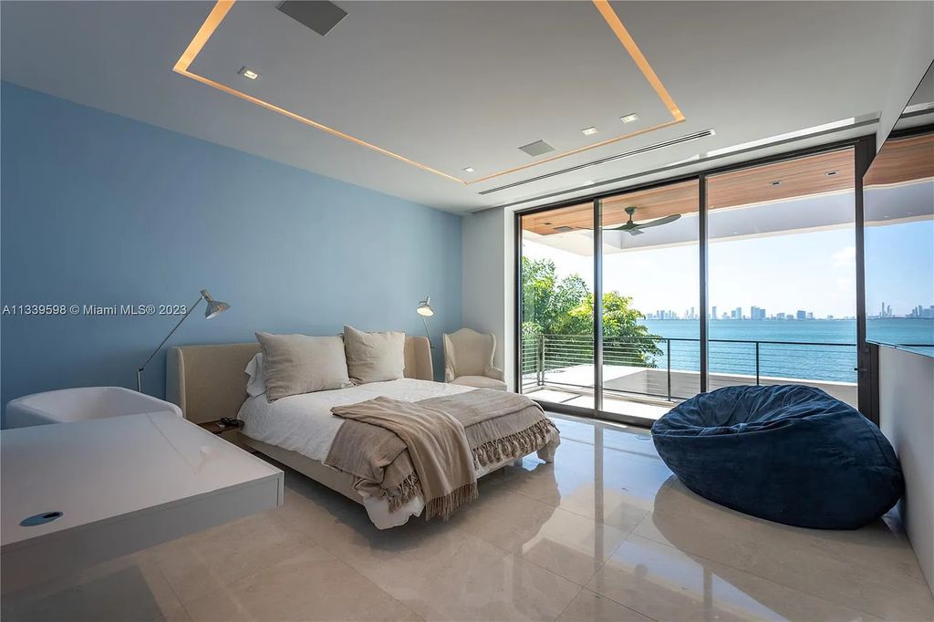 5718 N Bay Road, Miami Beach, Florida, is the perfect residence for luxury living. It features high-luxury furnishings and unmatched indoor/outdoor living spaces.