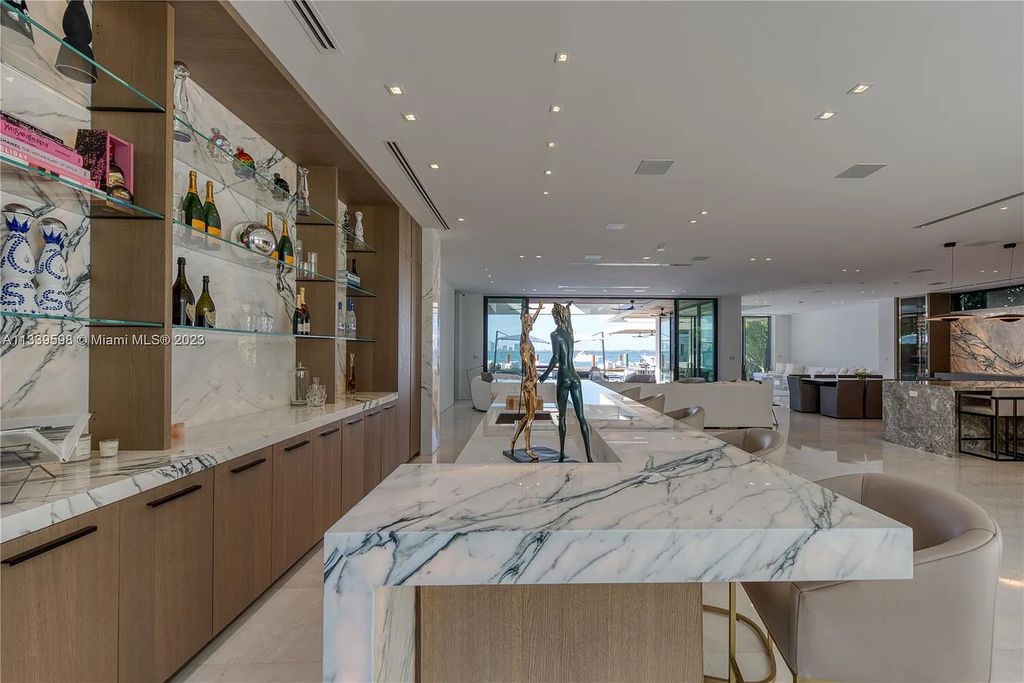 5718 N Bay Road, Miami Beach, Florida, is the perfect residence for luxury living. It features high-luxury furnishings and unmatched indoor/outdoor living spaces.
