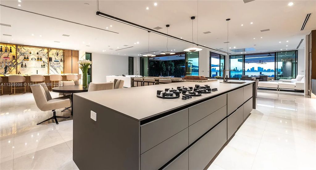 5718 N Bay Road, Miami Beach, Florida, is the perfect residence for luxury living. It features high-luxury furnishings and unmatched indoor/outdoor living spaces.