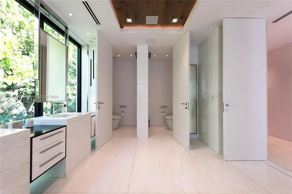 5718 N Bay Road, Miami Beach, Florida, is the perfect residence for luxury living. It features high-luxury furnishings and unmatched indoor/outdoor living spaces.