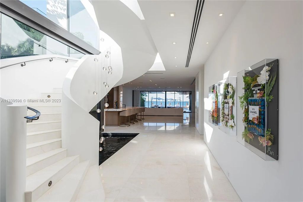 5718 N Bay Road, Miami Beach, Florida, is the perfect residence for luxury living. It features high-luxury furnishings and unmatched indoor/outdoor living spaces.