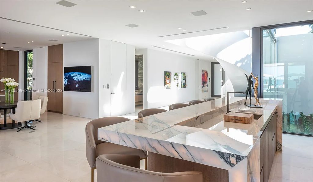 5718 N Bay Road, Miami Beach, Florida, is the perfect residence for luxury living. It features high-luxury furnishings and unmatched indoor/outdoor living spaces.