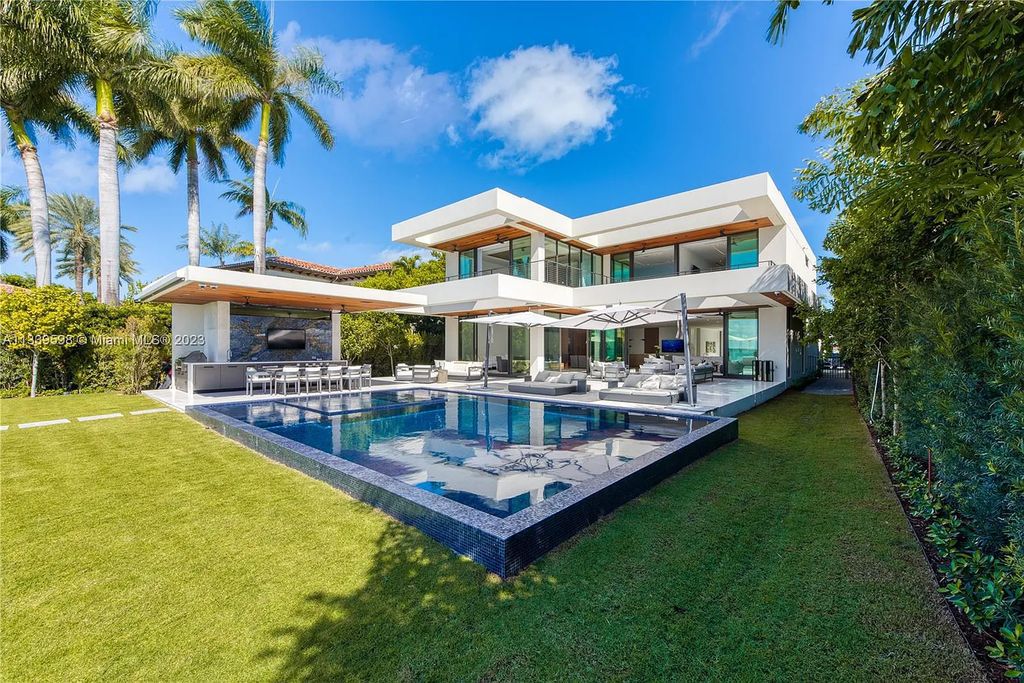 5718 N Bay Road, Miami Beach, Florida, is the perfect residence for luxury living. It features high-luxury furnishings and unmatched indoor/outdoor living spaces.