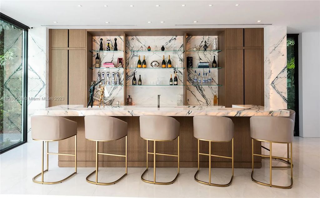 5718 N Bay Road, Miami Beach, Florida, is the perfect residence for luxury living. It features high-luxury furnishings and unmatched indoor/outdoor living spaces.