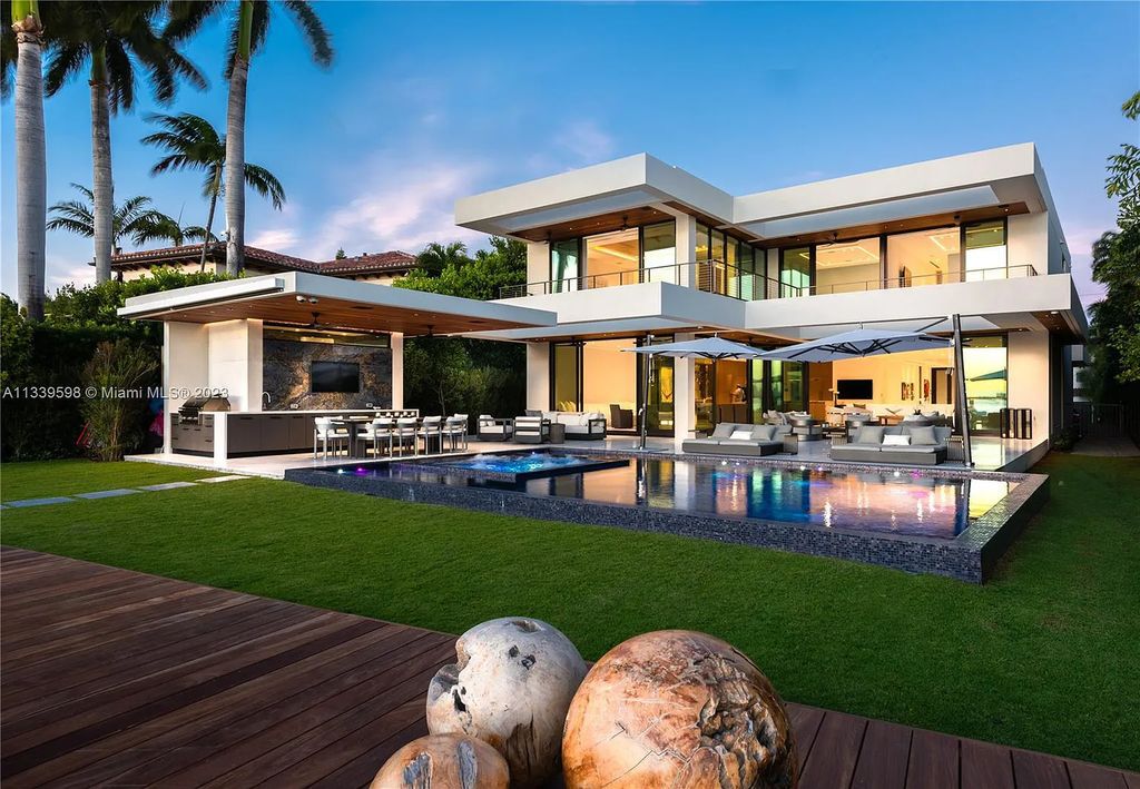 5718 N Bay Road, Miami Beach, Florida, is the perfect residence for luxury living. It features high-luxury furnishings and unmatched indoor/outdoor living spaces.