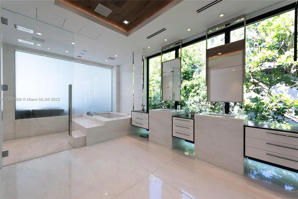 5718 N Bay Road, Miami Beach, Florida, is the perfect residence for luxury living. It features high-luxury furnishings and unmatched indoor/outdoor living spaces.