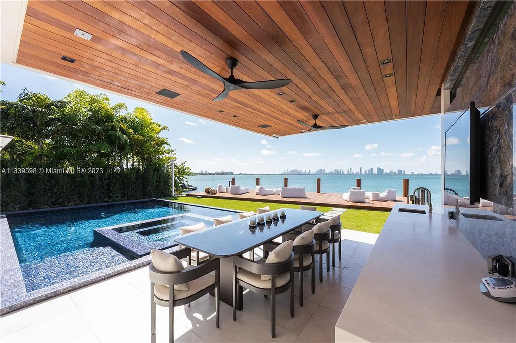 5718 N Bay Road, Miami Beach, Florida, is the perfect residence for luxury living. It features high-luxury furnishings and unmatched indoor/outdoor living spaces.