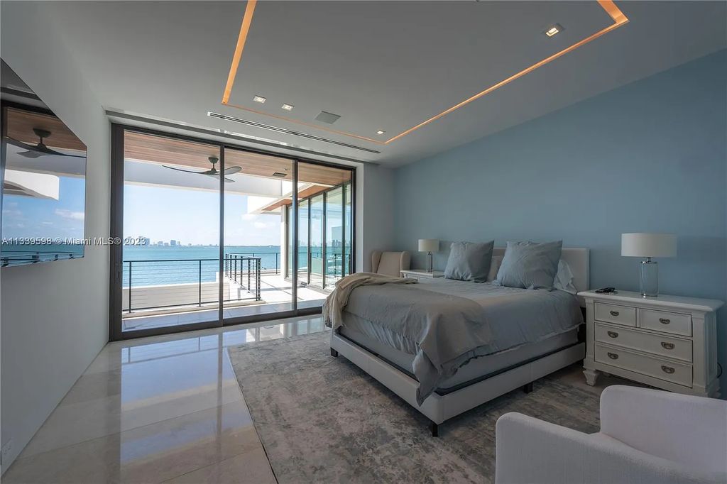 5718 N Bay Road, Miami Beach, Florida, is the perfect residence for luxury living. It features high-luxury furnishings and unmatched indoor/outdoor living spaces.
