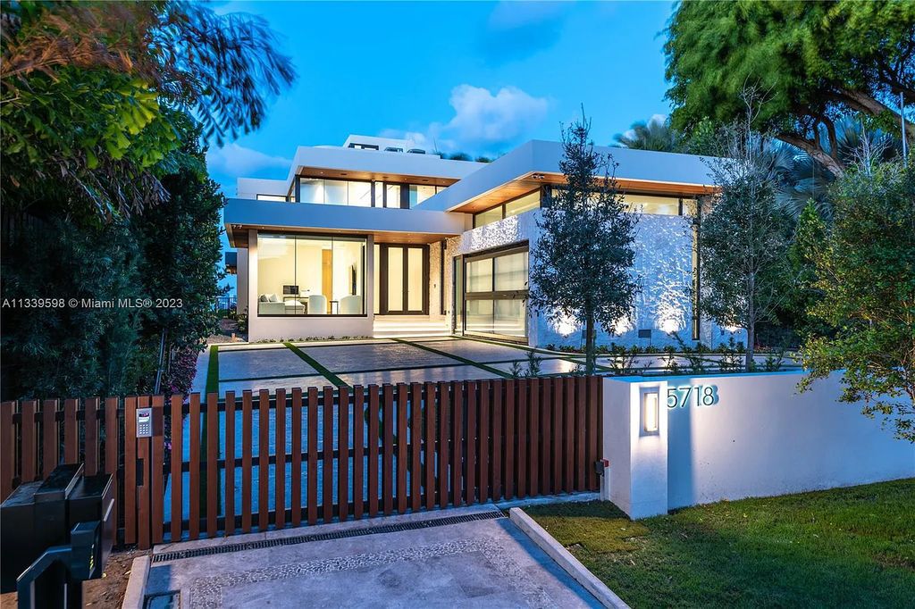 5718 N Bay Road, Miami Beach, Florida, is the perfect residence for luxury living. It features high-luxury furnishings and unmatched indoor/outdoor living spaces.