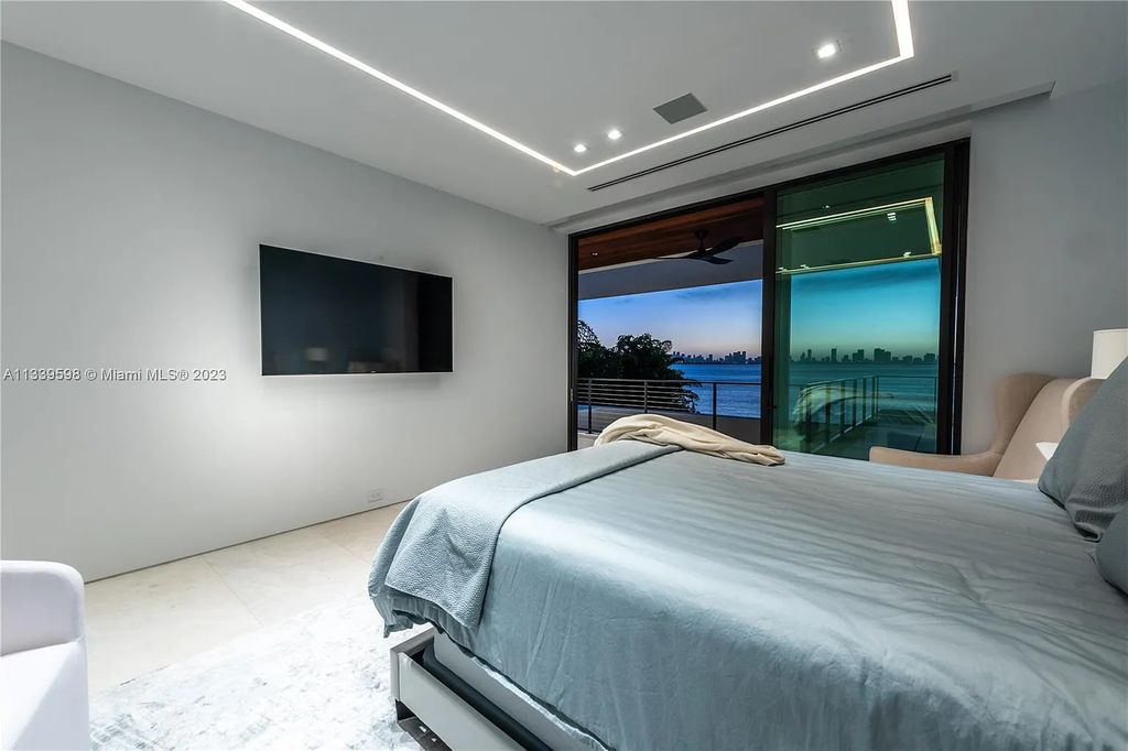 5718 N Bay Road, Miami Beach, Florida, is the perfect residence for luxury living. It features high-luxury furnishings and unmatched indoor/outdoor living spaces.
