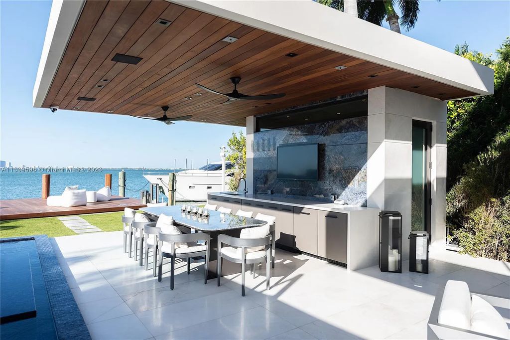 5718 N Bay Road, Miami Beach, Florida, is the perfect residence for luxury living. It features high-luxury furnishings and unmatched indoor/outdoor living spaces.