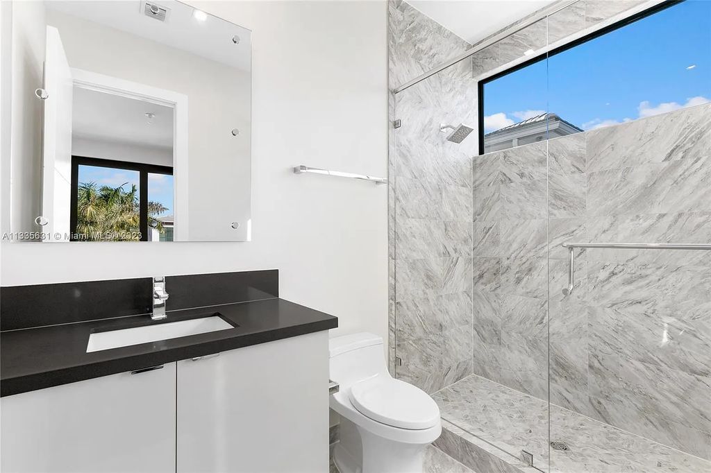 17199 Brulee Breeze Way, Boca Raton, Florida, is located in one of Boca Raton’s most sought after communities, Boca Bridges Estates.
