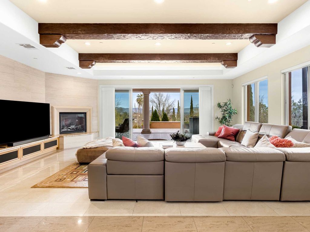 This beautiful Tuscany-inspired estate is located at 19609 W Citrus Ridge Dr, Tarzana, California. Built in 2015, the property sits on a vast 1.66-acre lot and boasts sweeping city light views. The house features 5 bedrooms and 7 bathrooms, with a living area of 6,581 square feet. 