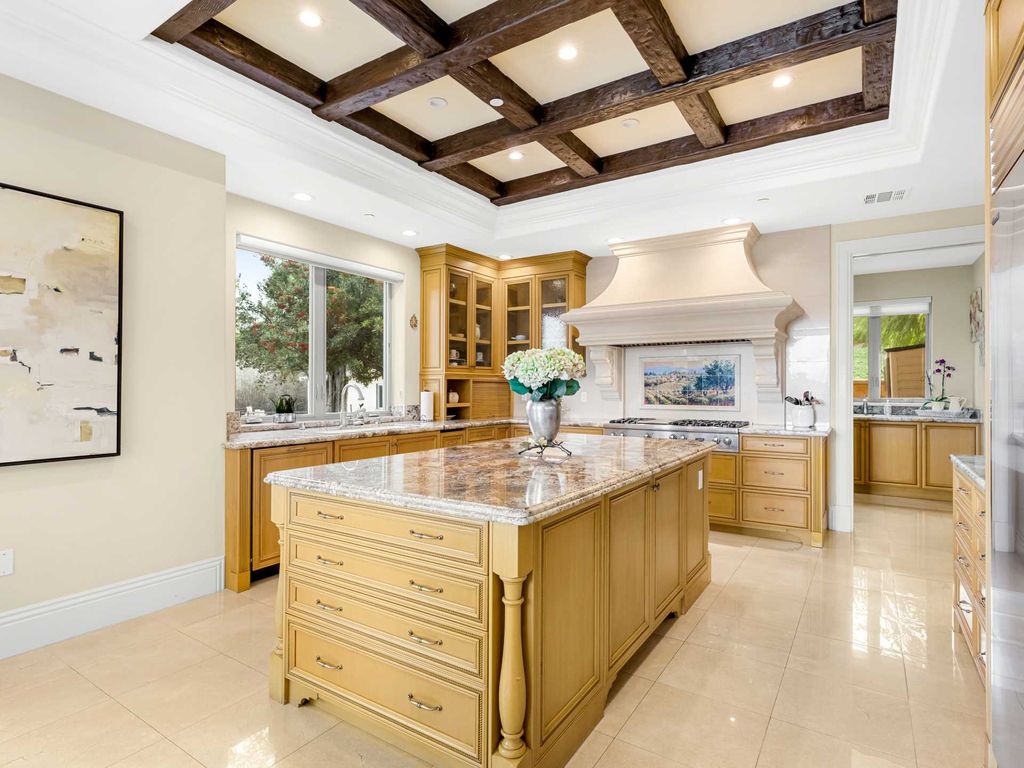 This beautiful Tuscany-inspired estate is located at 19609 W Citrus Ridge Dr, Tarzana, California. Built in 2015, the property sits on a vast 1.66-acre lot and boasts sweeping city light views. The house features 5 bedrooms and 7 bathrooms, with a living area of 6,581 square feet. 