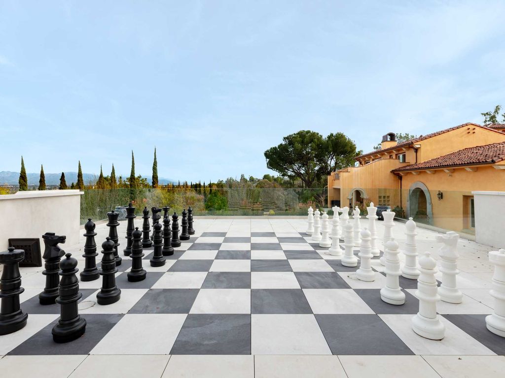 This beautiful Tuscany-inspired estate is located at 19609 W Citrus Ridge Dr, Tarzana, California. Built in 2015, the property sits on a vast 1.66-acre lot and boasts sweeping city light views. The house features 5 bedrooms and 7 bathrooms, with a living area of 6,581 square feet. 