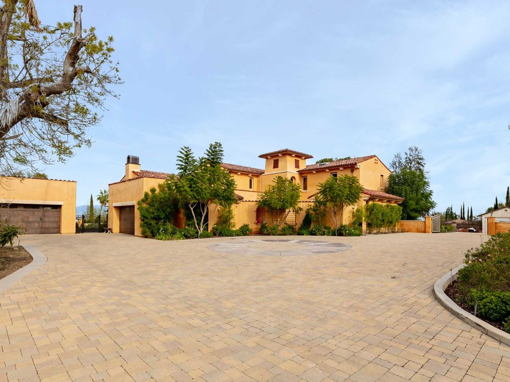 This beautiful Tuscany-inspired estate is located at 19609 W Citrus Ridge Dr, Tarzana, California. Built in 2015, the property sits on a vast 1.66-acre lot and boasts sweeping city light views. The house features 5 bedrooms and 7 bathrooms, with a living area of 6,581 square feet. 