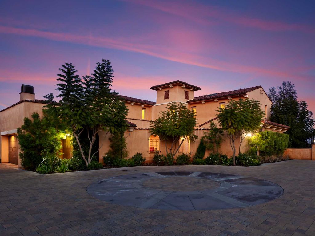 This beautiful Tuscany-inspired estate is located at 19609 W Citrus Ridge Dr, Tarzana, California. Built in 2015, the property sits on a vast 1.66-acre lot and boasts sweeping city light views. The house features 5 bedrooms and 7 bathrooms, with a living area of 6,581 square feet. 