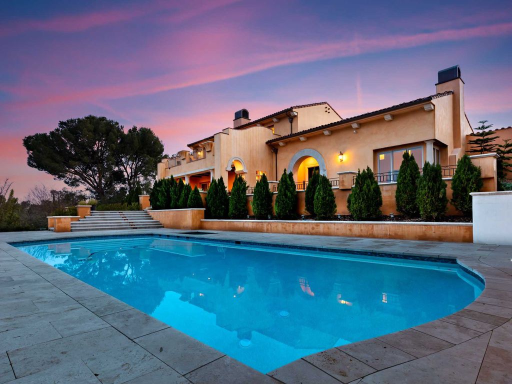 This beautiful Tuscany-inspired estate is located at 19609 W Citrus Ridge Dr, Tarzana, California. Built in 2015, the property sits on a vast 1.66-acre lot and boasts sweeping city light views. The house features 5 bedrooms and 7 bathrooms, with a living area of 6,581 square feet. 