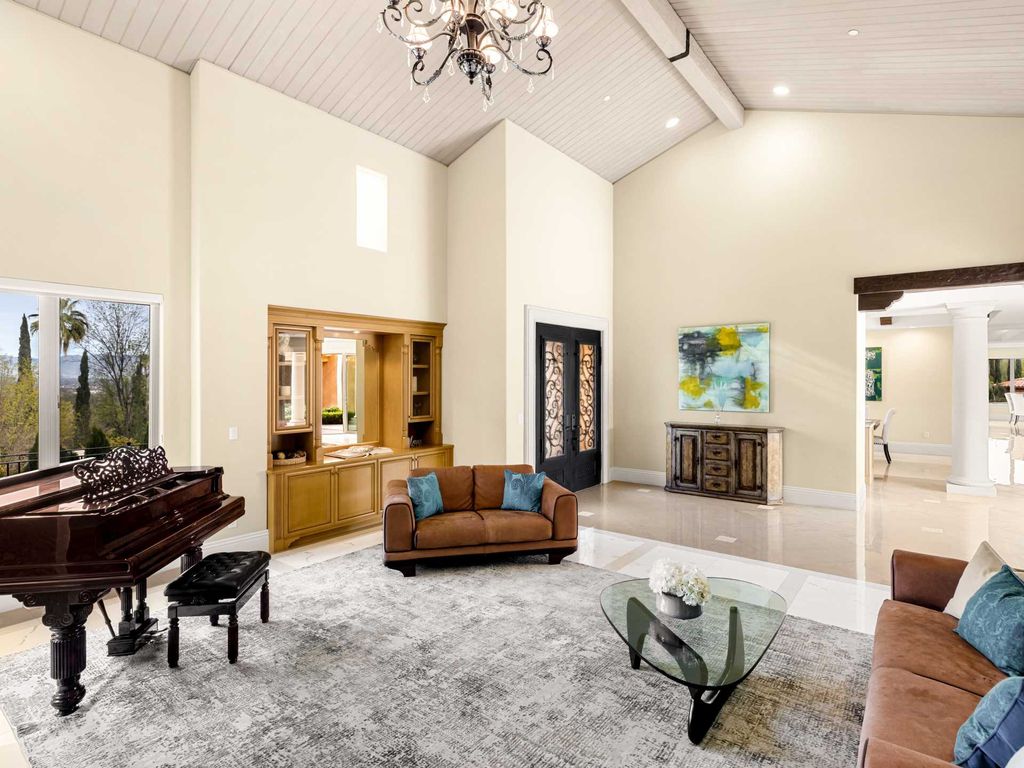 This beautiful Tuscany-inspired estate is located at 19609 W Citrus Ridge Dr, Tarzana, California. Built in 2015, the property sits on a vast 1.66-acre lot and boasts sweeping city light views. The house features 5 bedrooms and 7 bathrooms, with a living area of 6,581 square feet. 