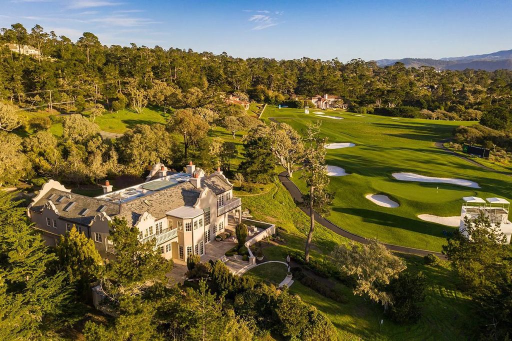 3410 Seventeen Mile Drive positioned on the 12th hole of the renowned Pebble Beach Golf Links, this property sits on a beautifully manicured 2.42-acre parcel, making it one of the largest properties on the course. The estate offers a gated entrance, ensuring privacy and security for its residents.