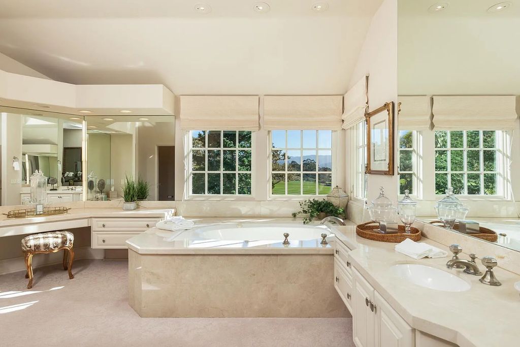 3410 Seventeen Mile Drive positioned on the 12th hole of the renowned Pebble Beach Golf Links, this property sits on a beautifully manicured 2.42-acre parcel, making it one of the largest properties on the course. The estate offers a gated entrance, ensuring privacy and security for its residents.