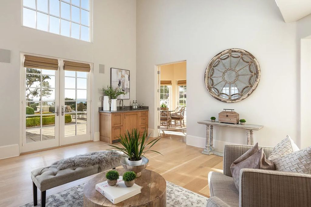 3410 Seventeen Mile Drive positioned on the 12th hole of the renowned Pebble Beach Golf Links, this property sits on a beautifully manicured 2.42-acre parcel, making it one of the largest properties on the course. The estate offers a gated entrance, ensuring privacy and security for its residents.