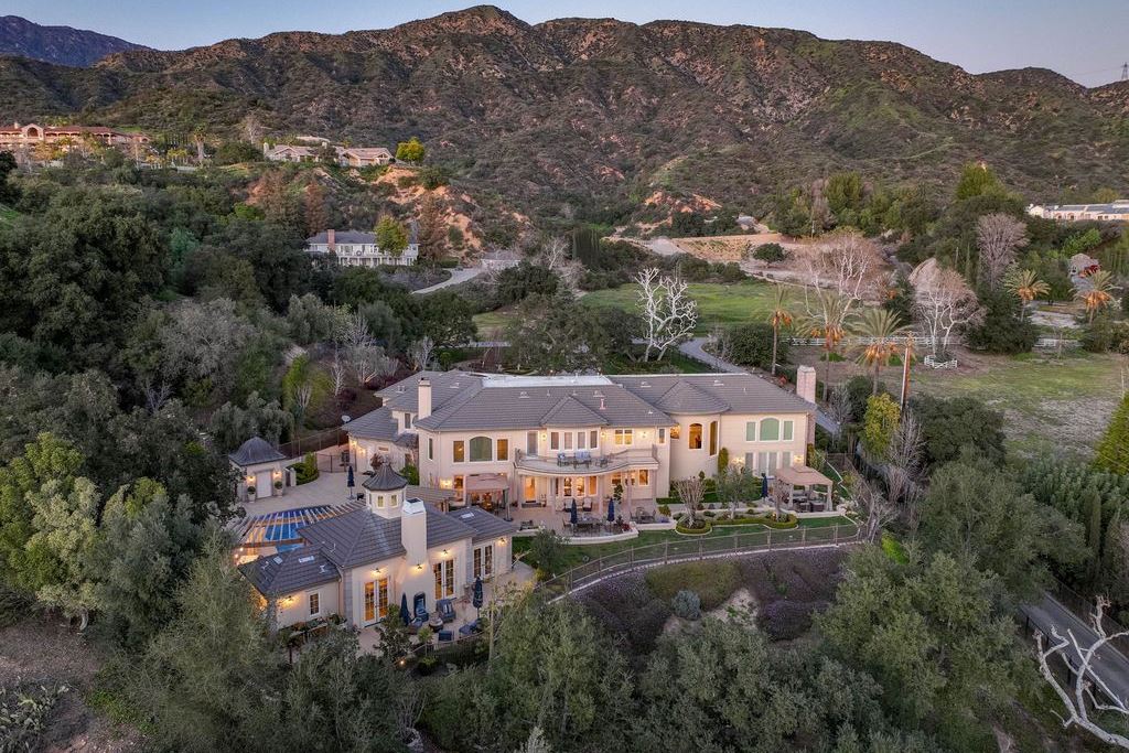 This North-facing French-inspired estate is located in the prestigious Bradbury Estates, an exclusive equestrian and estate community close to L.A., Pasadena, and the Santa Anita Race Track. Built in 2000 by Mur-sol, this custom estate boasts 6 bedrooms with walk-in closets, including a downstairs guest wing with a private bath, and a library.