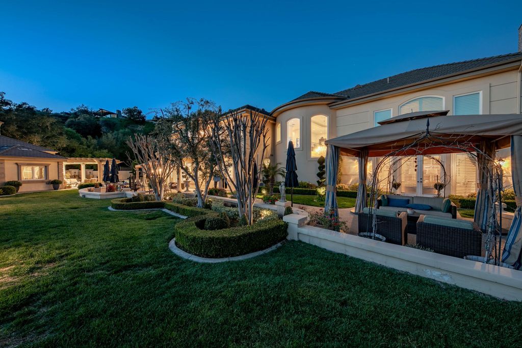 This North-facing French-inspired estate is located in the prestigious Bradbury Estates, an exclusive equestrian and estate community close to L.A., Pasadena, and the Santa Anita Race Track. Built in 2000 by Mur-sol, this custom estate boasts 6 bedrooms with walk-in closets, including a downstairs guest wing with a private bath, and a library.