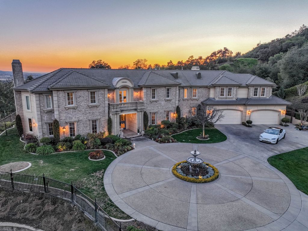 This North-facing French-inspired estate is located in the prestigious Bradbury Estates, an exclusive equestrian and estate community close to L.A., Pasadena, and the Santa Anita Race Track. Built in 2000 by Mur-sol, this custom estate boasts 6 bedrooms with walk-in closets, including a downstairs guest wing with a private bath, and a library.