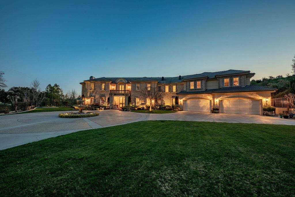 This North-facing French-inspired estate is located in the prestigious Bradbury Estates, an exclusive equestrian and estate community close to L.A., Pasadena, and the Santa Anita Race Track. Built in 2000 by Mur-sol, this custom estate boasts 6 bedrooms with walk-in closets, including a downstairs guest wing with a private bath, and a library.