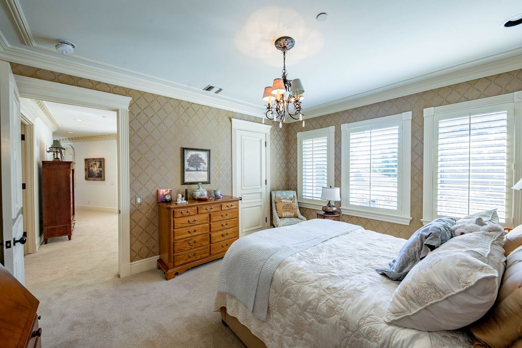 This North-facing French-inspired estate is located in the prestigious Bradbury Estates, an exclusive equestrian and estate community close to L.A., Pasadena, and the Santa Anita Race Track. Built in 2000 by Mur-sol, this custom estate boasts 6 bedrooms with walk-in closets, including a downstairs guest wing with a private bath, and a library.