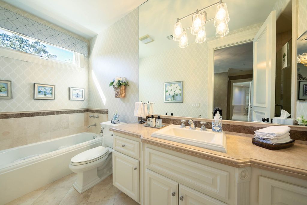 This North-facing French-inspired estate is located in the prestigious Bradbury Estates, an exclusive equestrian and estate community close to L.A., Pasadena, and the Santa Anita Race Track. Built in 2000 by Mur-sol, this custom estate boasts 6 bedrooms with walk-in closets, including a downstairs guest wing with a private bath, and a library.