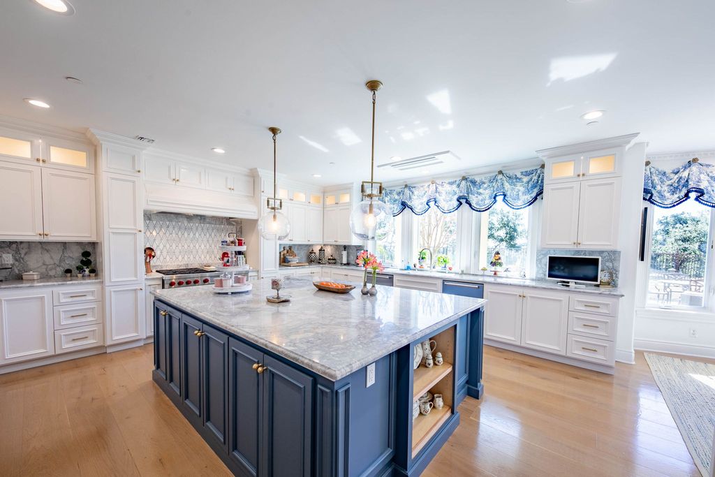 This North-facing French-inspired estate is located in the prestigious Bradbury Estates, an exclusive equestrian and estate community close to L.A., Pasadena, and the Santa Anita Race Track. Built in 2000 by Mur-sol, this custom estate boasts 6 bedrooms with walk-in closets, including a downstairs guest wing with a private bath, and a library.