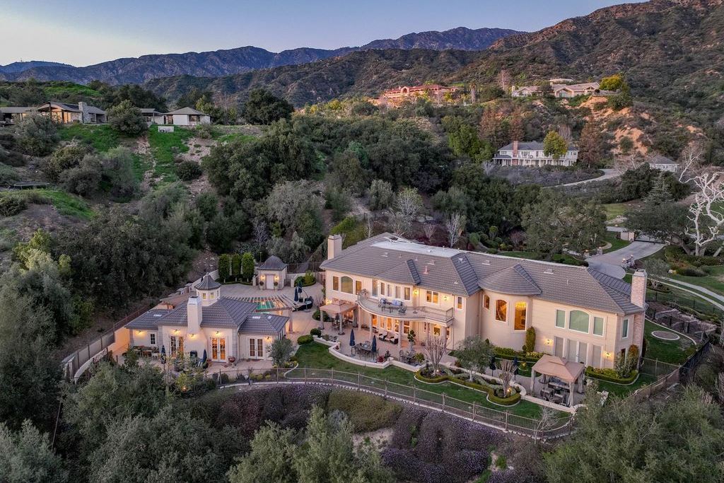 This North-facing French-inspired estate is located in the prestigious Bradbury Estates, an exclusive equestrian and estate community close to L.A., Pasadena, and the Santa Anita Race Track. Built in 2000 by Mur-sol, this custom estate boasts 6 bedrooms with walk-in closets, including a downstairs guest wing with a private bath, and a library.