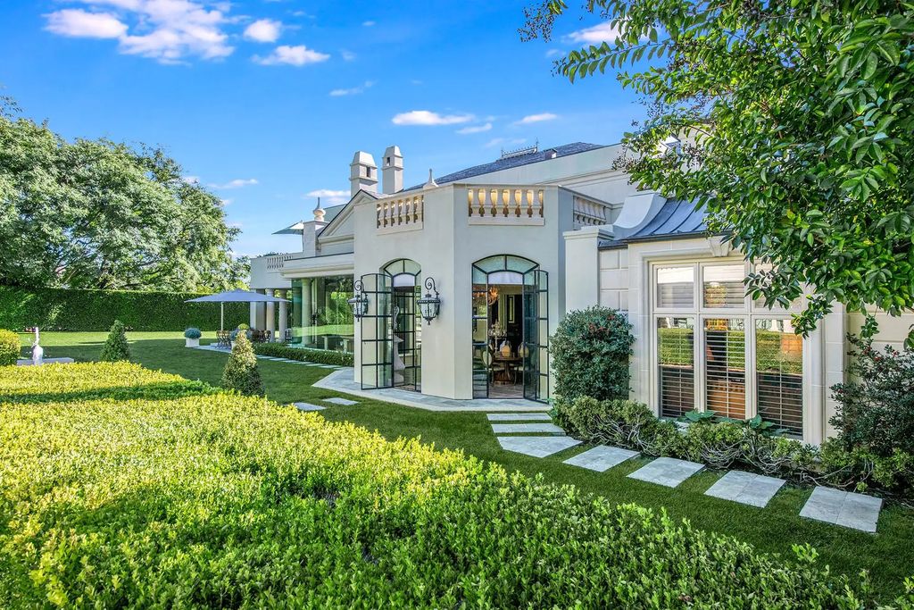 55 Beverly Park is a grand-scale residence located in the exclusive guard-gated enclave of Beverly Park. This luxurious estate, expertly designed by acclaimed architect Bob Ray Offenhauser, exudes an air of French Chateau meets Southern California living, and sits on 2.89 acres of romantic French-style garden landscaping.