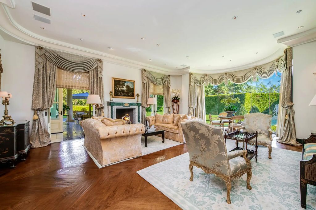 55 Beverly Park is a grand-scale residence located in the exclusive guard-gated enclave of Beverly Park. This luxurious estate, expertly designed by acclaimed architect Bob Ray Offenhauser, exudes an air of French Chateau meets Southern California living, and sits on 2.89 acres of romantic French-style garden landscaping.