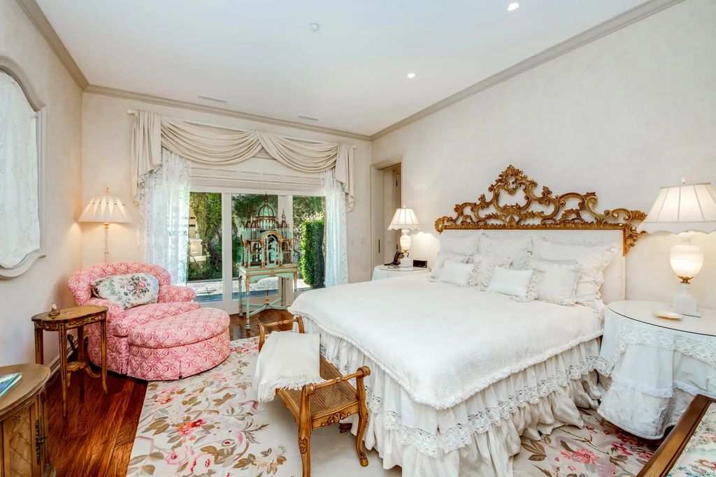 55 Beverly Park is a grand-scale residence located in the exclusive guard-gated enclave of Beverly Park. This luxurious estate, expertly designed by acclaimed architect Bob Ray Offenhauser, exudes an air of French Chateau meets Southern California living, and sits on 2.89 acres of romantic French-style garden landscaping.
