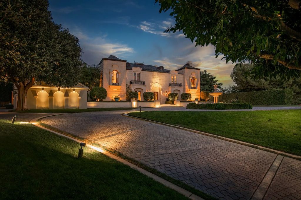 55 Beverly Park is a grand-scale residence located in the exclusive guard-gated enclave of Beverly Park. This luxurious estate, expertly designed by acclaimed architect Bob Ray Offenhauser, exudes an air of French Chateau meets Southern California living, and sits on 2.89 acres of romantic French-style garden landscaping.