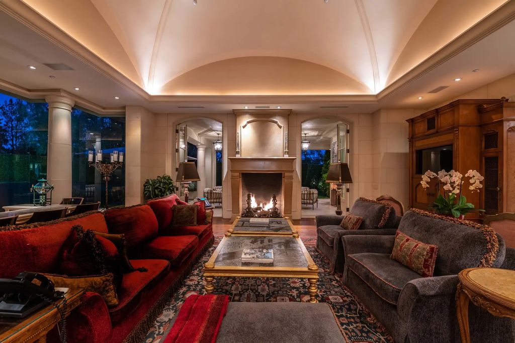 55 Beverly Park is a grand-scale residence located in the exclusive guard-gated enclave of Beverly Park. This luxurious estate, expertly designed by acclaimed architect Bob Ray Offenhauser, exudes an air of French Chateau meets Southern California living, and sits on 2.89 acres of romantic French-style garden landscaping.