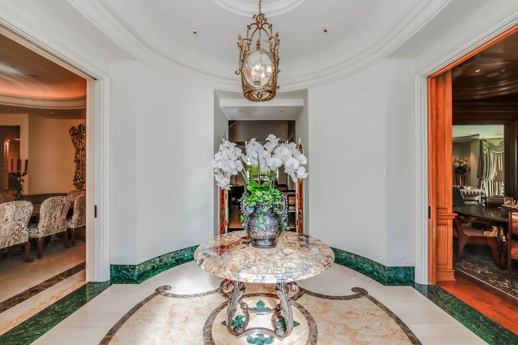 55 Beverly Park is a grand-scale residence located in the exclusive guard-gated enclave of Beverly Park. This luxurious estate, expertly designed by acclaimed architect Bob Ray Offenhauser, exudes an air of French Chateau meets Southern California living, and sits on 2.89 acres of romantic French-style garden landscaping.
