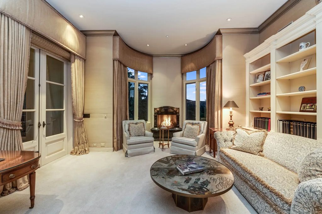 55 Beverly Park is a grand-scale residence located in the exclusive guard-gated enclave of Beverly Park. This luxurious estate, expertly designed by acclaimed architect Bob Ray Offenhauser, exudes an air of French Chateau meets Southern California living, and sits on 2.89 acres of romantic French-style garden landscaping.