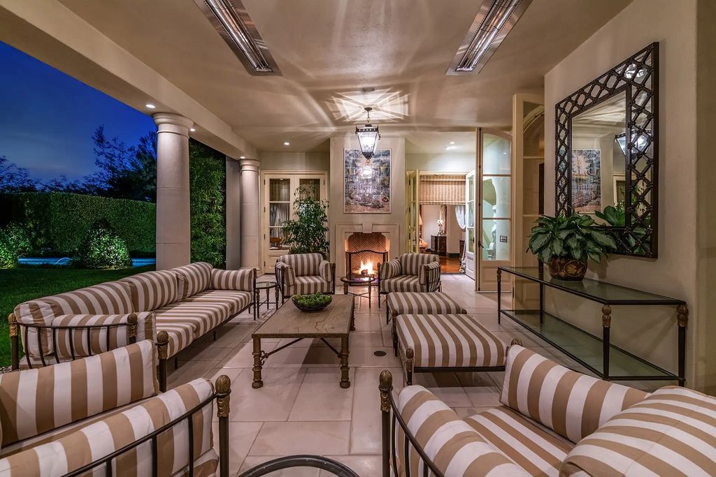 55 Beverly Park is a grand-scale residence located in the exclusive guard-gated enclave of Beverly Park. This luxurious estate, expertly designed by acclaimed architect Bob Ray Offenhauser, exudes an air of French Chateau meets Southern California living, and sits on 2.89 acres of romantic French-style garden landscaping.