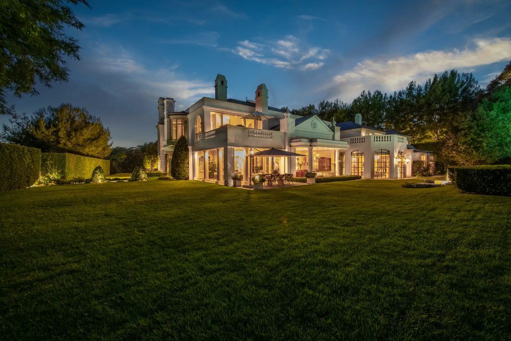 55 Beverly Park is a grand-scale residence located in the exclusive guard-gated enclave of Beverly Park. This luxurious estate, expertly designed by acclaimed architect Bob Ray Offenhauser, exudes an air of French Chateau meets Southern California living, and sits on 2.89 acres of romantic French-style garden landscaping.