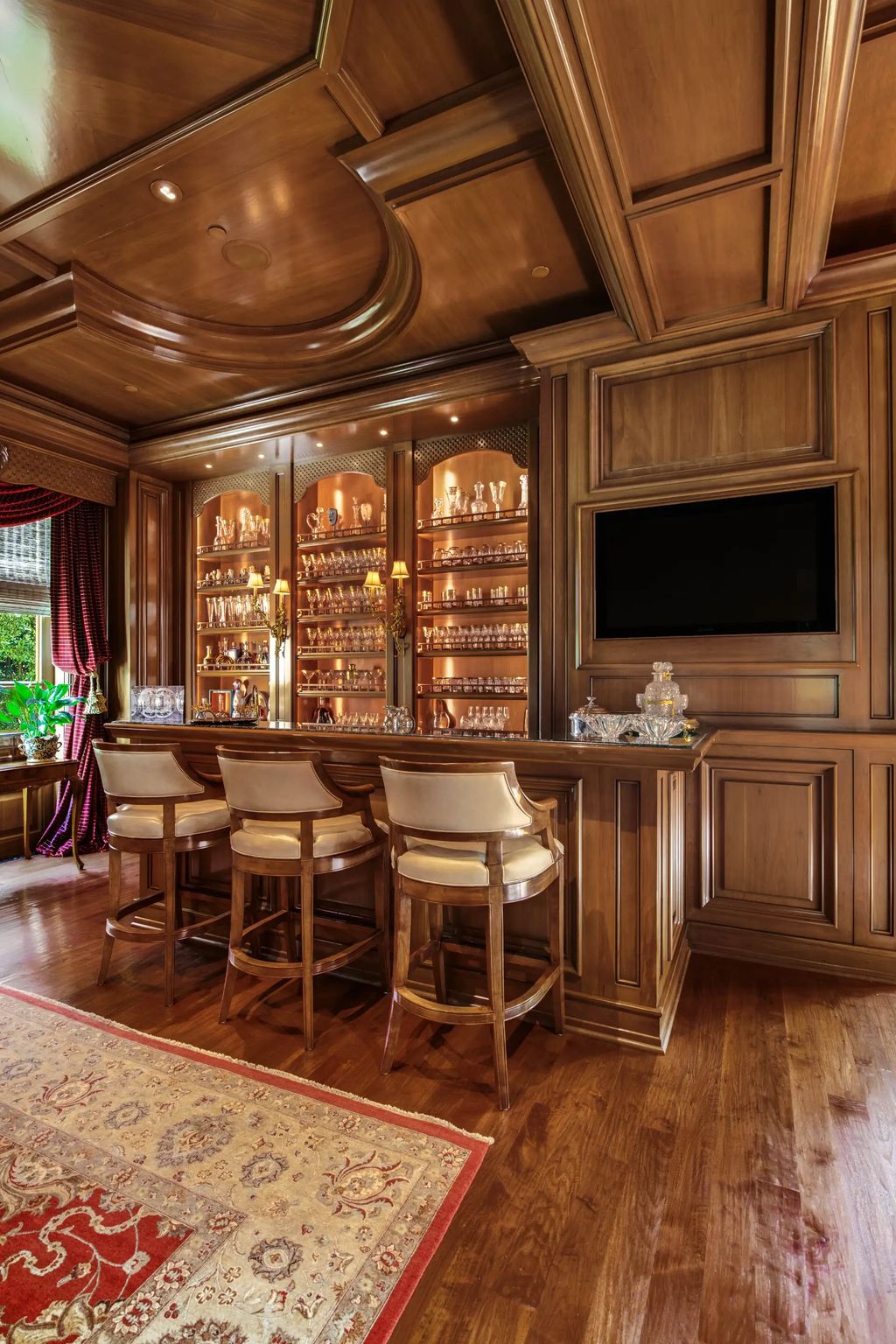 55 Beverly Park is a grand-scale residence located in the exclusive guard-gated enclave of Beverly Park. This luxurious estate, expertly designed by acclaimed architect Bob Ray Offenhauser, exudes an air of French Chateau meets Southern California living, and sits on 2.89 acres of romantic French-style garden landscaping.