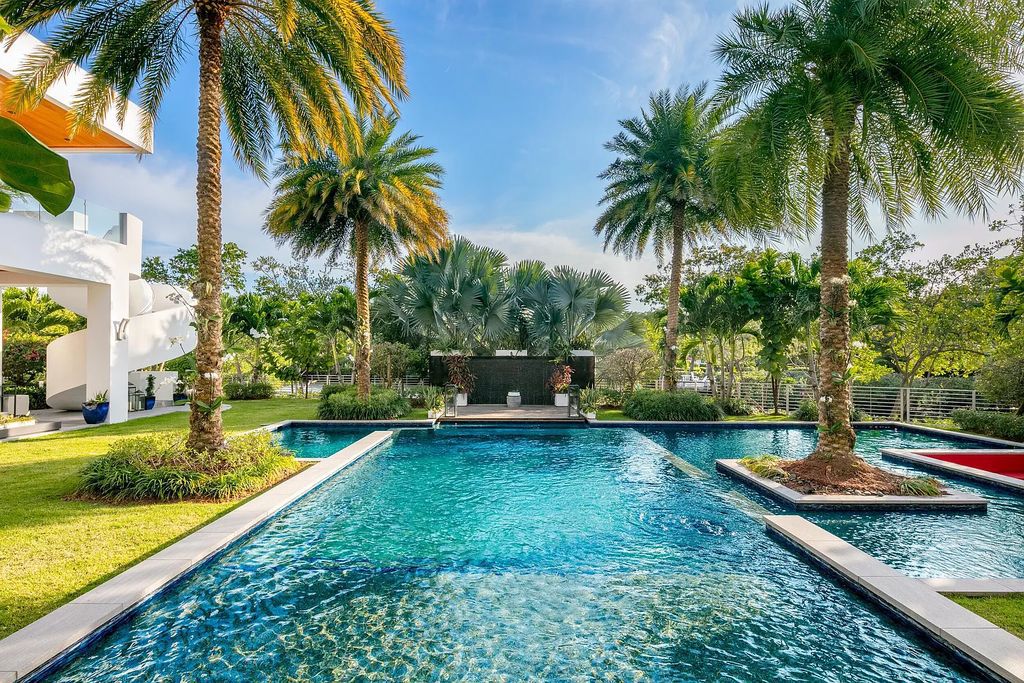 1104 Seminole Boulevard, Villa Azura at Seminole Landing is a contemporary architectural masterpiece nestled in the oceanfront community of North Palm Beach, Florida.