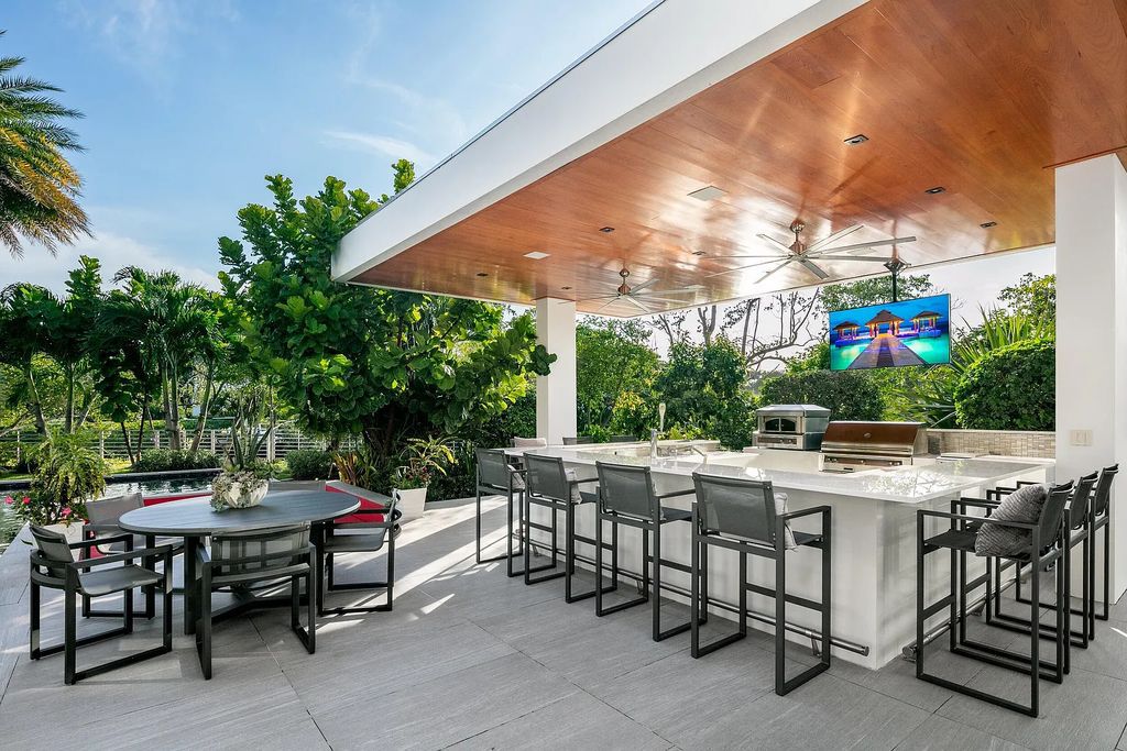 1104 Seminole Boulevard, Villa Azura at Seminole Landing is a contemporary architectural masterpiece nestled in the oceanfront community of North Palm Beach, Florida.