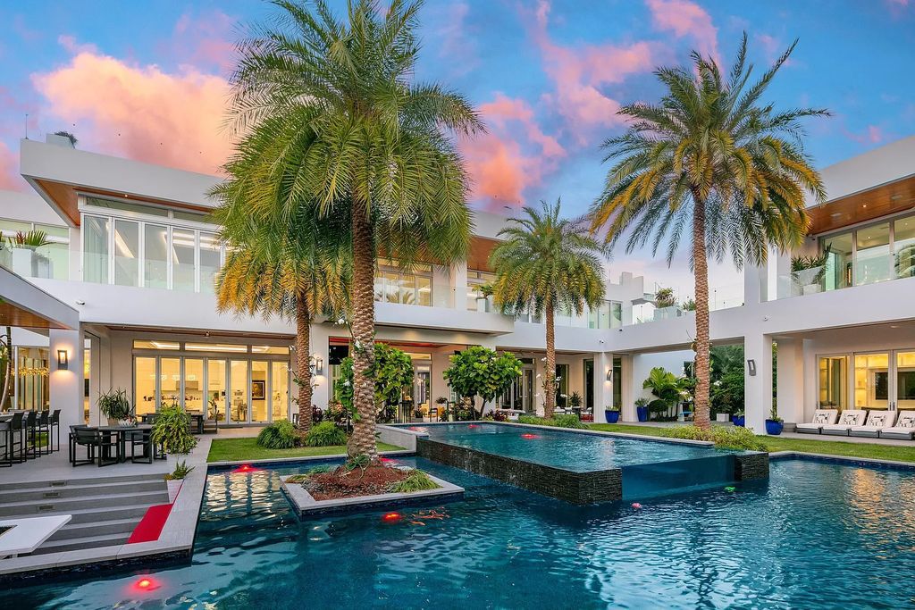 1104 Seminole Boulevard, Villa Azura at Seminole Landing is a contemporary architectural masterpiece nestled in the oceanfront community of North Palm Beach, Florida.