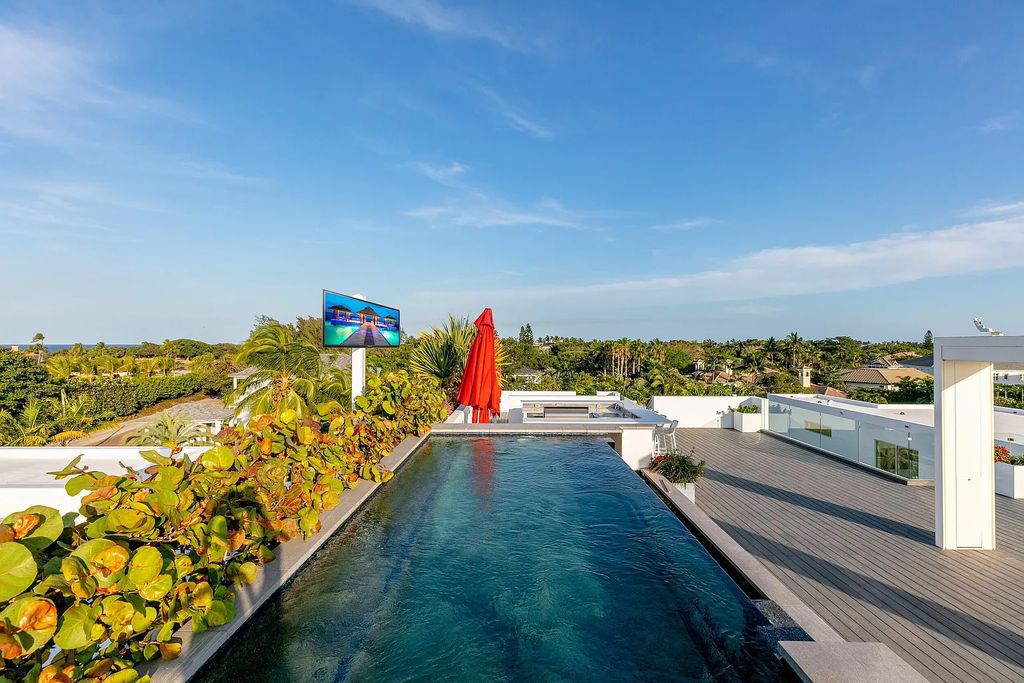 1104 Seminole Boulevard, Villa Azura at Seminole Landing is a contemporary architectural masterpiece nestled in the oceanfront community of North Palm Beach, Florida.